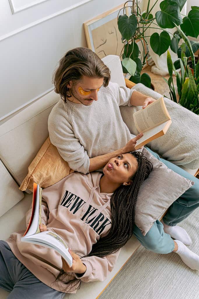 a man and woman reading books together