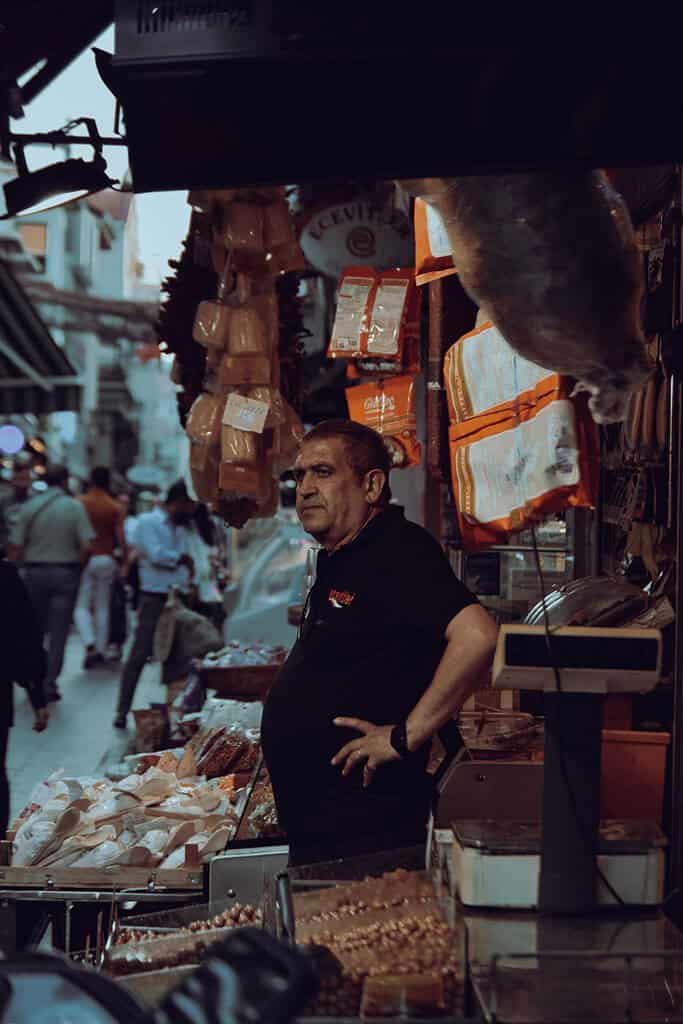 a man standing beside his products