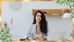A businesswoman sitting in her desk