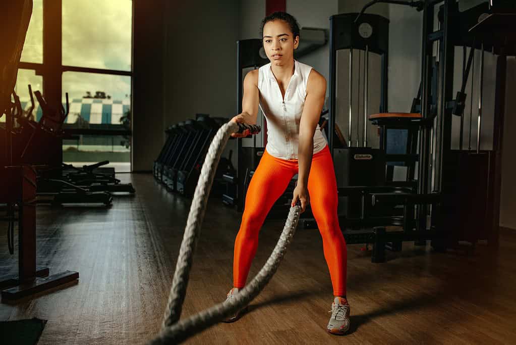 a woman doing exercise at the gym