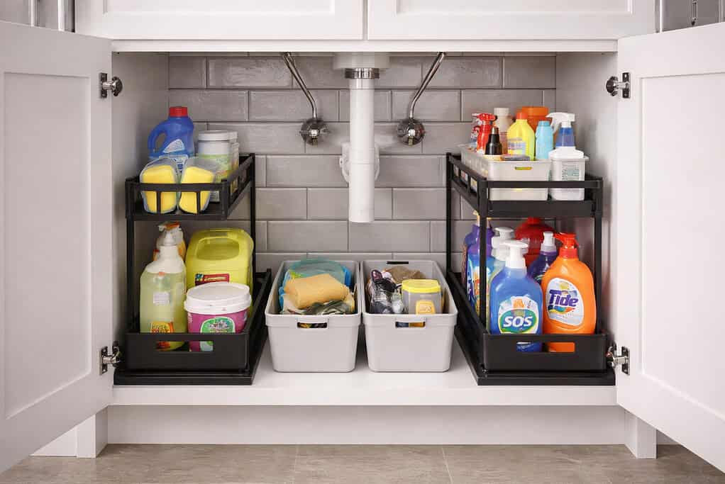 Bathroom cleaning essentails organize in an under the sink storage