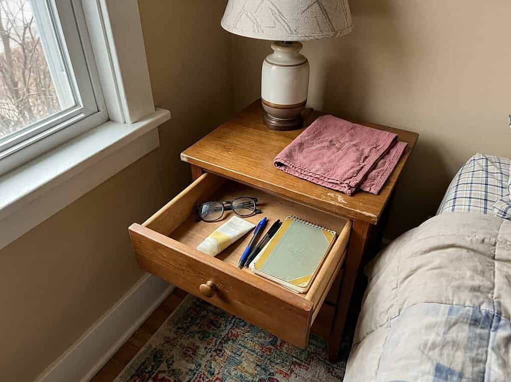 One small nightstand drawer opened to start on, picking the smallest, easiest spot to begin